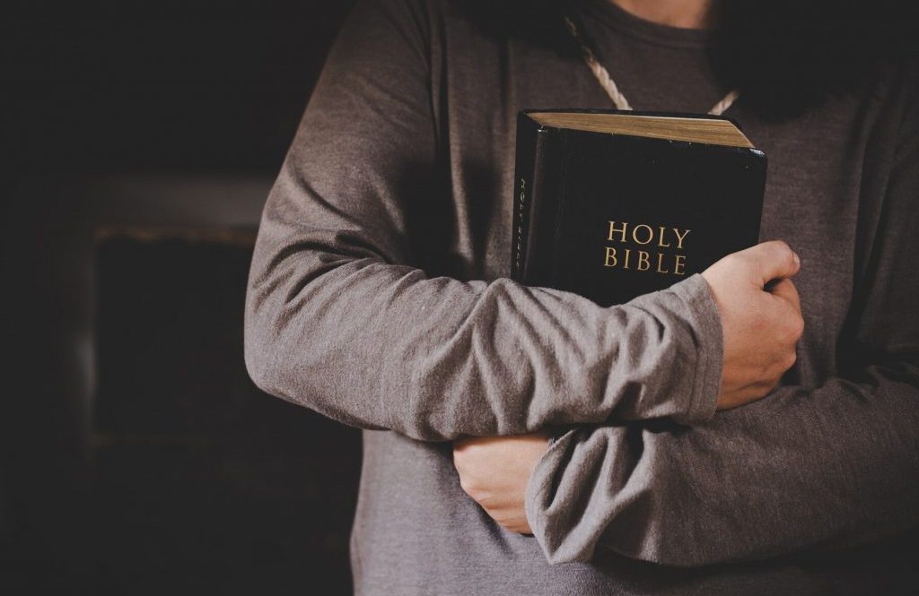 spirituality-religion-hands-folded-prayer-holy-bible-church-concept-faith_1150-15025