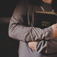 spirituality-religion-hands-folded-prayer-holy-bible-church-concept-faith_1150-15025